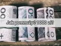 Zrolowane banknoty polskie, w tym 100 zł, 50 zł i 20 zł, leżą na drewnianym tle. Tekst na obrazku pyta: "Jak pomnożyć 1000 zł?".