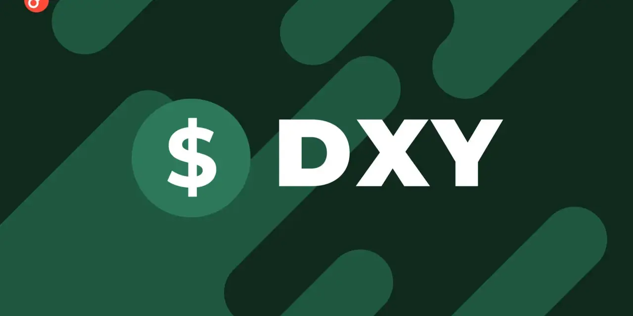 Symbol dolara i litery DXY na zielonym tle. DXY to indeks dolara amerykańskiego, klucz do zrozumienia rynków walutowych.
