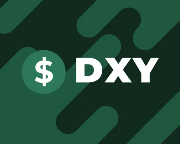 Symbol dolara i litery DXY na zielonym tle. DXY to indeks dolara amerykańskiego, klucz do zrozumienia rynków walutowych.