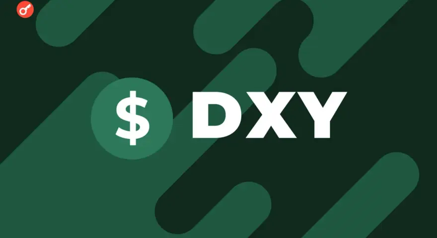 Symbol dolara i litery DXY na zielonym tle. DXY to indeks dolara amerykańskiego, klucz do zrozumienia rynków walutowych.